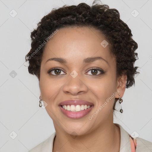 Joyful black young-adult female with long  brown hair and brown eyes