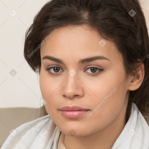 Neutral white young-adult female with long  brown hair and brown eyes