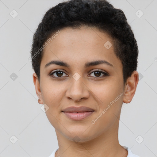 Joyful latino young-adult female with short  brown hair and brown eyes