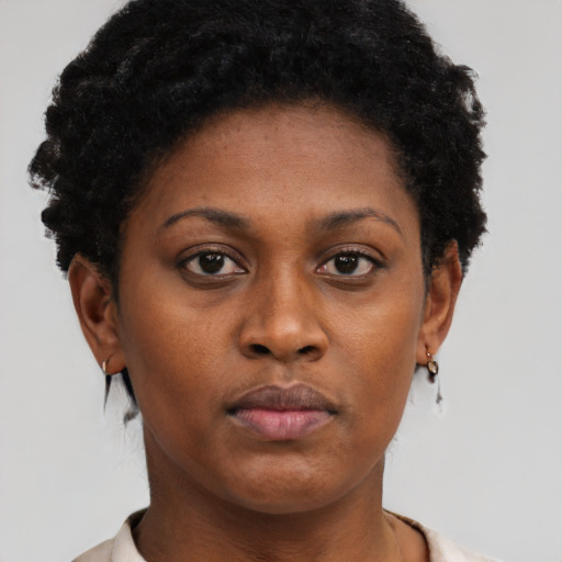 Neutral black young-adult female with short  brown hair and brown eyes