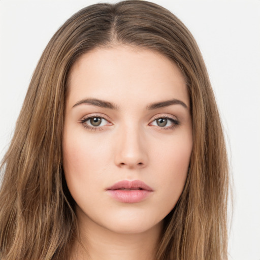 Neutral white young-adult female with long  brown hair and brown eyes