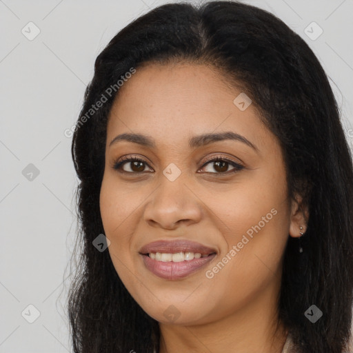 Joyful latino young-adult female with long  brown hair and brown eyes