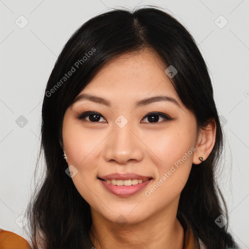 Joyful asian young-adult female with medium  black hair and brown eyes