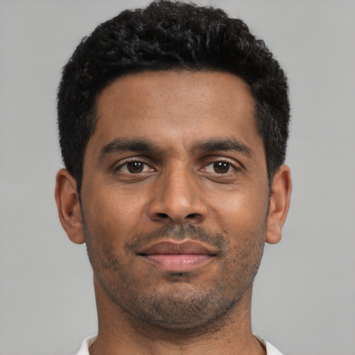 Neutral black young-adult male with short  black hair and brown eyes