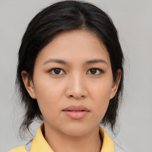 Neutral asian young-adult female with medium  brown hair and brown eyes