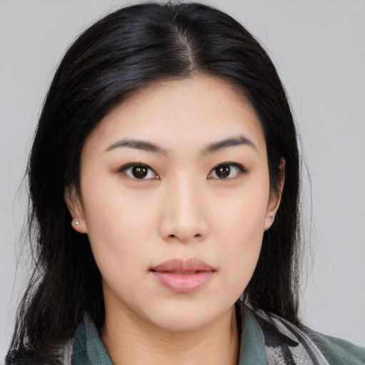 Neutral asian young-adult female with medium  black hair and brown eyes