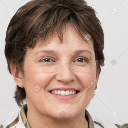 Joyful white adult female with medium  brown hair and grey eyes