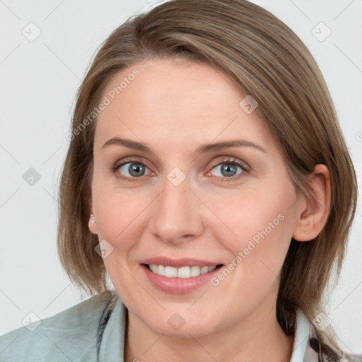 Joyful white young-adult female with medium  brown hair and blue eyes