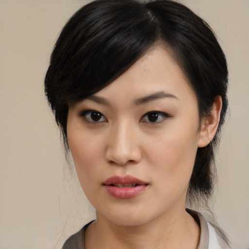 Neutral asian young-adult female with medium  black hair and brown eyes