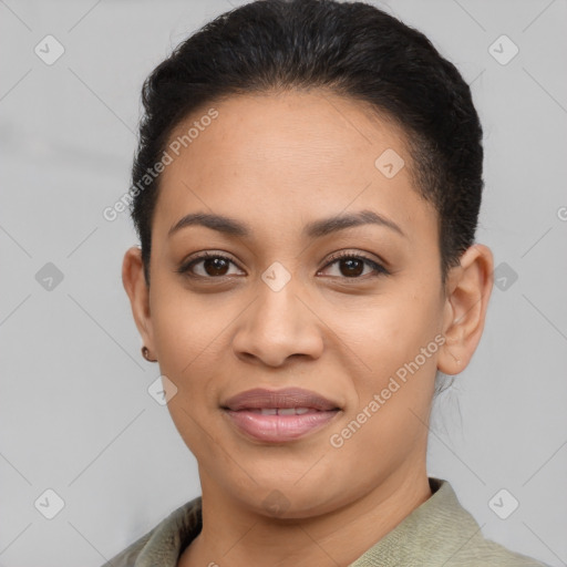 Joyful latino young-adult female with short  black hair and brown eyes