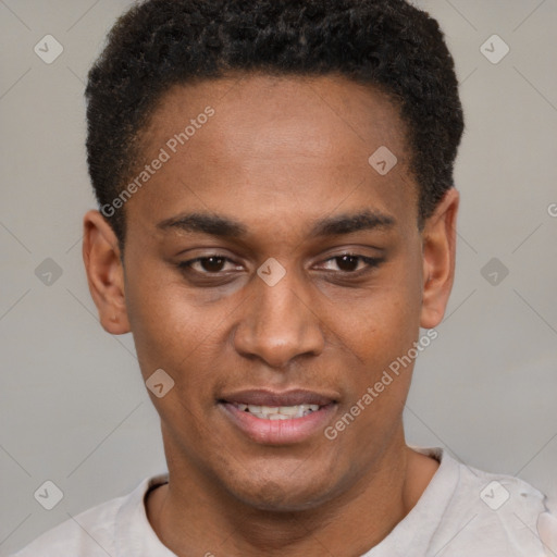 Joyful black young-adult male with short  brown hair and brown eyes