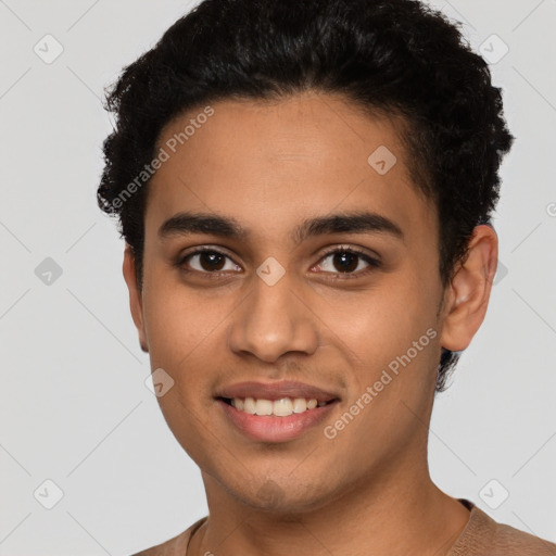 Joyful latino young-adult male with short  brown hair and brown eyes