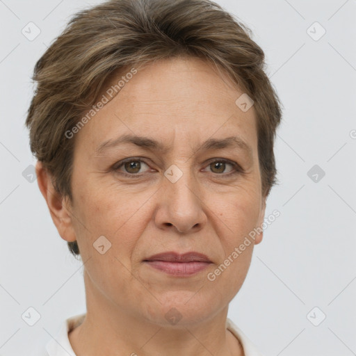 Joyful white adult female with short  brown hair and grey eyes