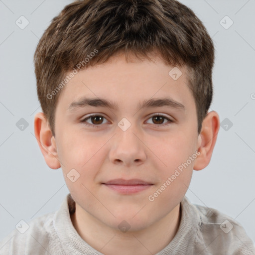 Joyful white child male with short  brown hair and brown eyes