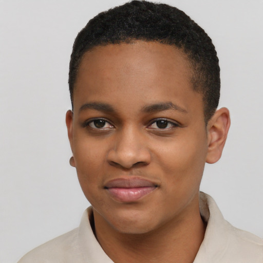Joyful black young-adult female with short  black hair and brown eyes