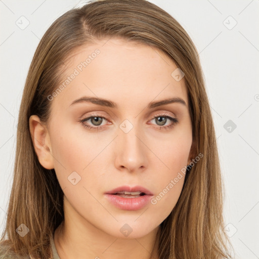 Neutral white young-adult female with long  brown hair and brown eyes