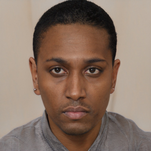 Neutral black young-adult male with short  black hair and brown eyes