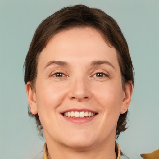 Joyful white adult female with short  brown hair and brown eyes