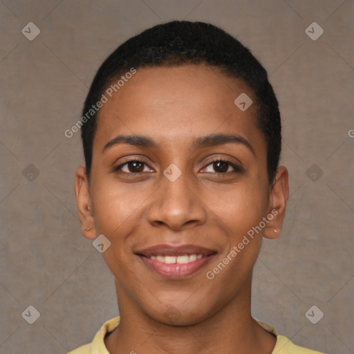 Joyful black young-adult female with short  brown hair and brown eyes