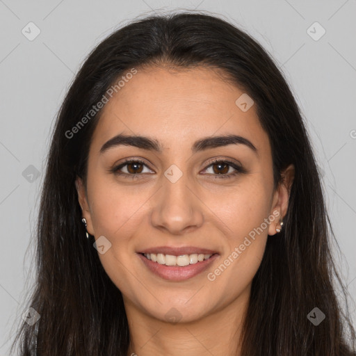 Joyful white young-adult female with long  brown hair and brown eyes