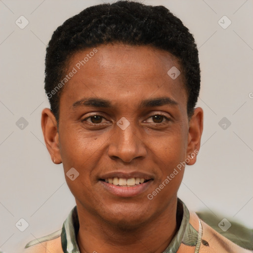 Joyful black young-adult male with short  brown hair and brown eyes