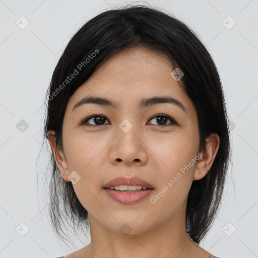 Joyful asian young-adult female with medium  black hair and brown eyes