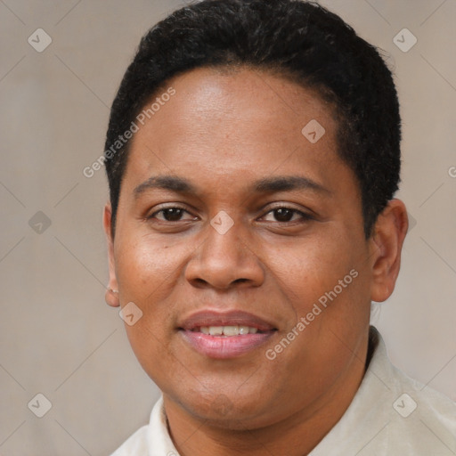 Joyful black adult female with short  brown hair and brown eyes