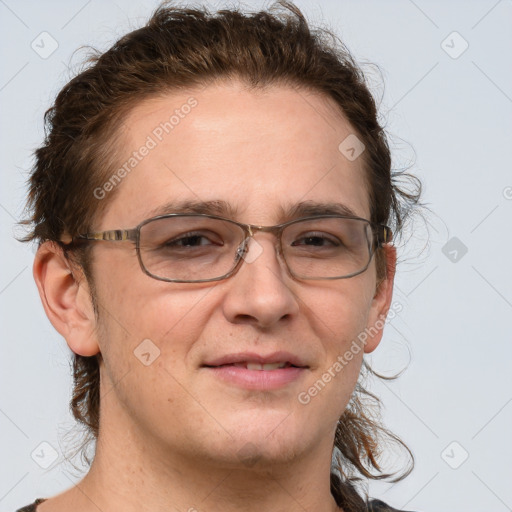 Joyful white adult male with short  brown hair and grey eyes