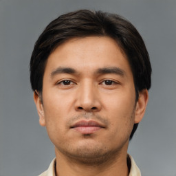 Neutral asian young-adult male with short  brown hair and brown eyes