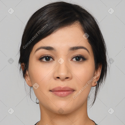 Joyful asian young-adult female with medium  black hair and brown eyes