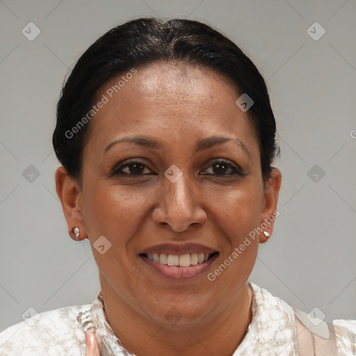 Joyful black adult female with short  brown hair and brown eyes