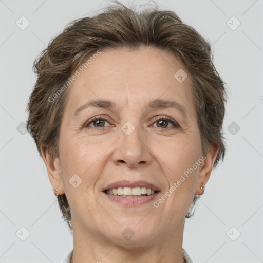 Joyful white adult female with short  brown hair and brown eyes