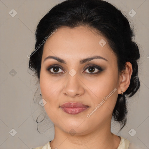 Joyful latino young-adult female with medium  brown hair and brown eyes