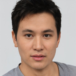 Neutral asian young-adult male with short  brown hair and brown eyes