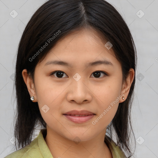 Joyful asian young-adult female with medium  brown hair and brown eyes