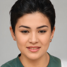 Joyful asian young-adult female with short  brown hair and brown eyes