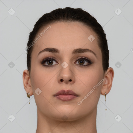 Neutral white young-adult female with short  brown hair and brown eyes