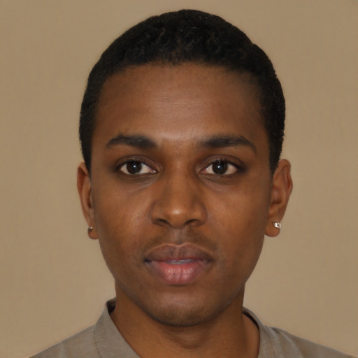 Neutral black young-adult male with short  black hair and brown eyes