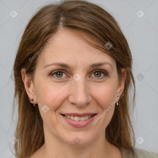 Joyful white adult female with medium  brown hair and grey eyes