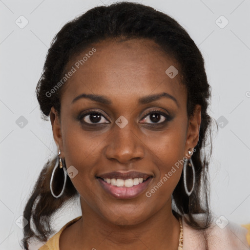 Joyful black young-adult female with long  brown hair and brown eyes