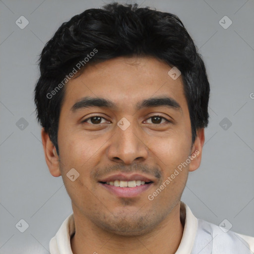 Joyful latino young-adult male with short  black hair and brown eyes