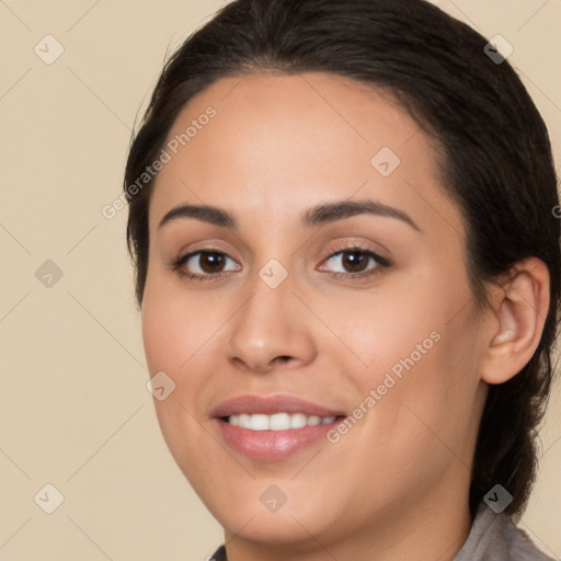 Joyful white young-adult female with long  brown hair and brown eyes