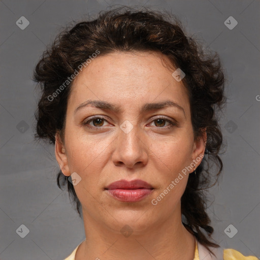 Joyful white adult female with short  brown hair and brown eyes