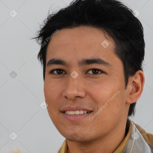 Joyful latino young-adult male with short  black hair and brown eyes