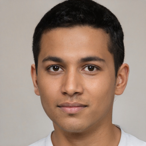 Neutral latino young-adult male with short  black hair and brown eyes