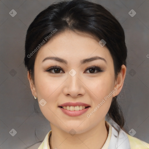 Joyful asian young-adult female with medium  brown hair and brown eyes