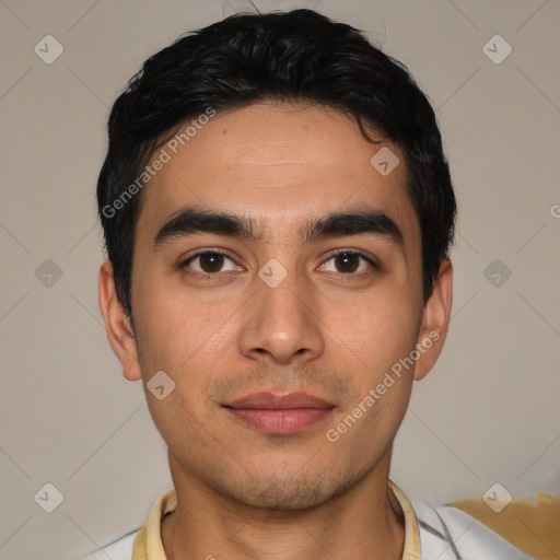 Joyful latino young-adult male with short  black hair and brown eyes