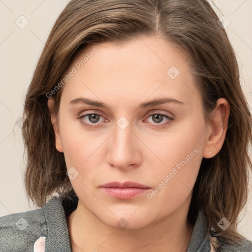 Neutral white young-adult female with medium  brown hair and grey eyes