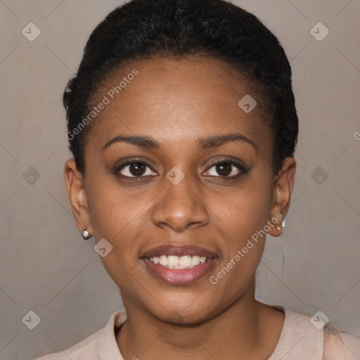 Joyful black young-adult female with short  black hair and brown eyes