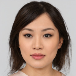 Neutral asian young-adult female with medium  brown hair and brown eyes